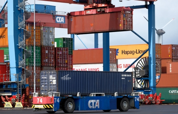 OECD điều chỉnh nâng dự báo tăng trưởng kinh tế toàn cầu