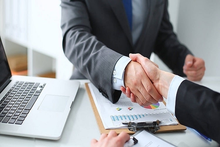 Các doanh nghiệp nước ngoài vẫn đặt nhiều niềm tin vào triển vọng kinh tế Việt Nam. 	Ảnh: ST