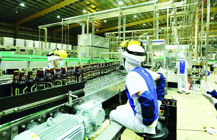 Doanh nghiệp bia, rượu: Tìm lối thoát từ “tác động kép"
