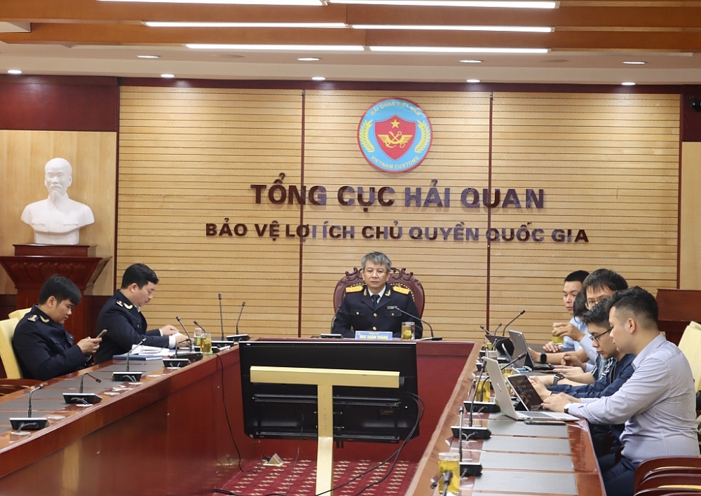 Phó Tổng cục trưởng Mai Xuân Thành chủ trì buổi làm việc nghe Công ty FPT trình bày giải pháp ngày 17-3. Ảnh: T.Bình.