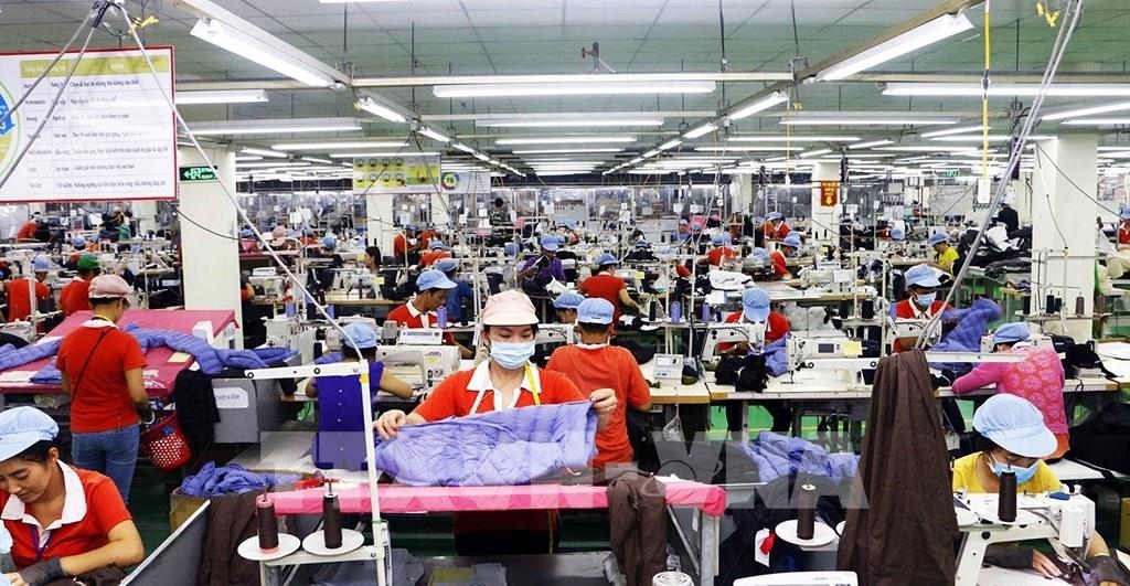 Sản xuất tại Công ty TNHH Kwong Lung Meko. Ảnh: TTXVN. Sản xuất tại Công ty TNHH Kwong Lung Meko. Ảnh: TTXVN.