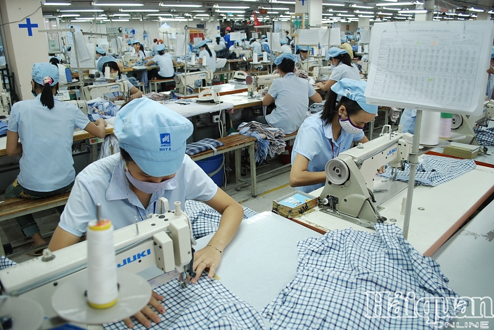 Xuất khẩu máy vi tính, dệt may tăng trưởng hàng trăm triệu USD