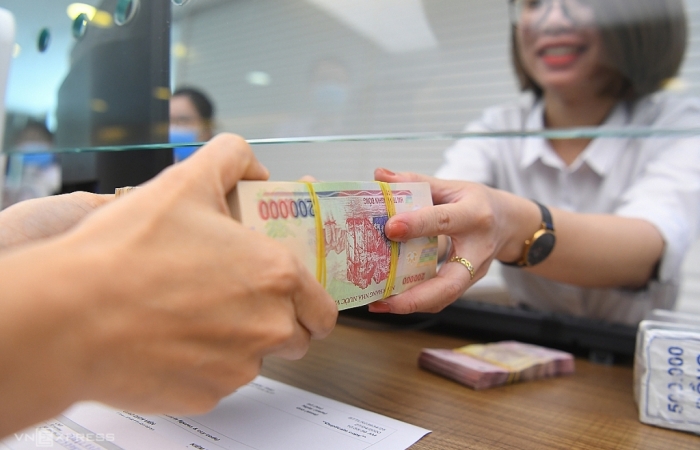 Dự báo mặt bằng lãi suất và phí dịch vụ ngân hàng tiếp tục giảm