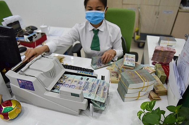 Nhu cầu vay vốn lớn, dự báo mặt bằng lãi suất sẽ tăng. Ảnh: Internet Nhu cầu vay vốn lớn, dự báo mặt bằng lãi suất sẽ tăng. Ảnh: Internet