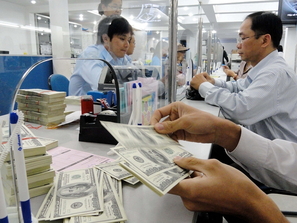 Ngân hàng tăng biên lợi nhuận từ kinh doanh ngoại hối. Ảnh: Internet