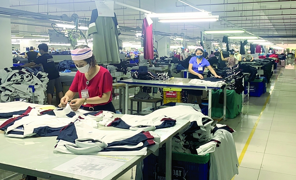 Dệt may là một trong những nhóm hàng chủ lực xuất khẩu sang thị trường Hồng Kông. 	Ảnh: N.Thanh Dệt may là một trong những nhóm hàng chủ lực xuất khẩu sang thị trường Hồng Kông. 	Ảnh: N.Thanh