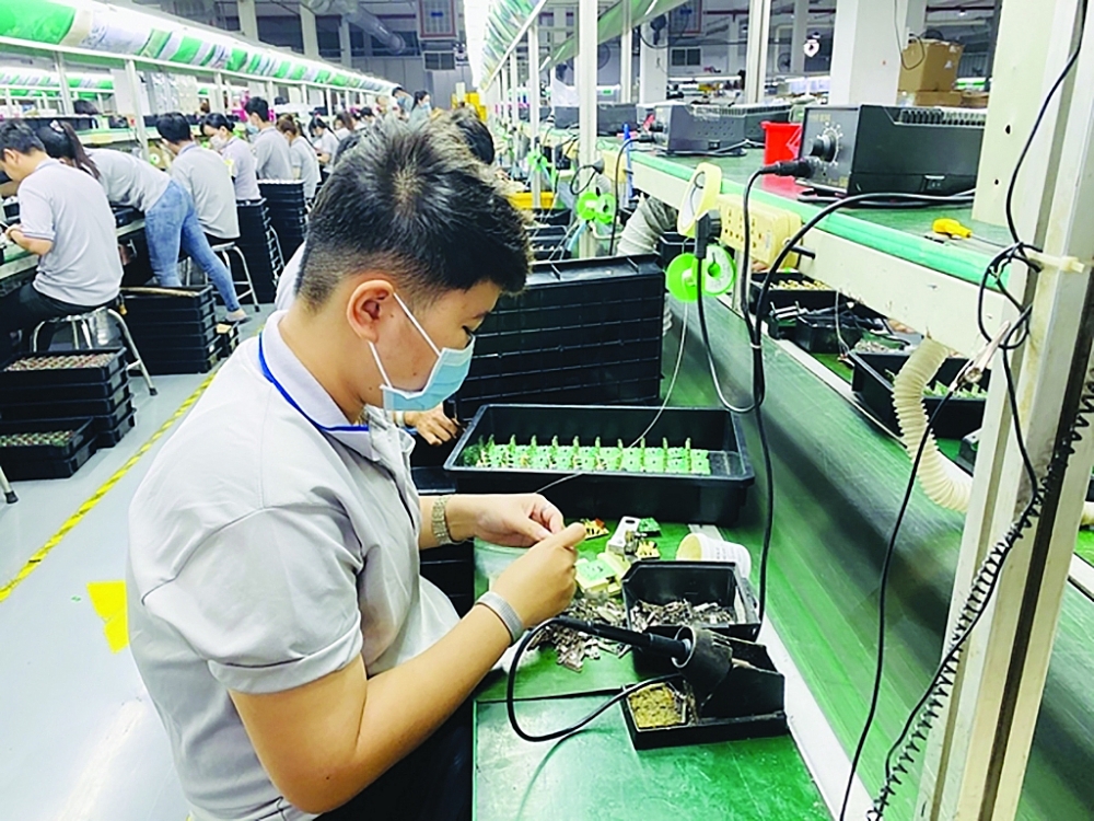 Khu vực FDI là động lực chính trong tăng trưởng xuất khẩu của Bình Dương. 	Ảnh: Tiểu My