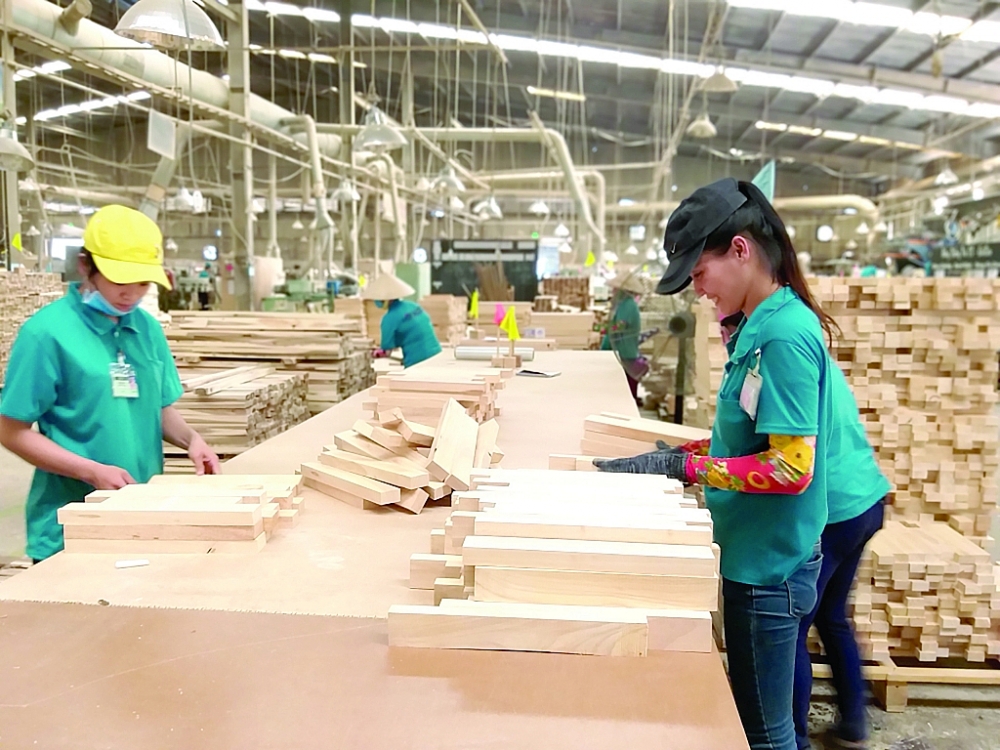 Dự kiến XK gỗ và sản phẩm gỗ năm nay sẽ đạt khoảng 13-14 tỷ USD. 	Ảnh: N.Thanh