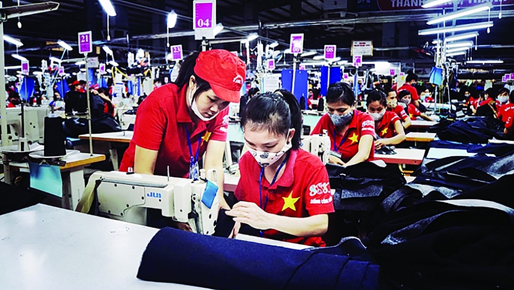 Năm 2020 là lần đầu tiên kim ngạch XK của ngành dệt may giảm sau 25 năm tăng trưởng liên tục. 	Ảnh: N.Thanh