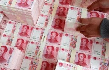 Nỗi lo bùng phát chiến tranh tiền tệ từ xung đột thương mại Mỹ-Trung