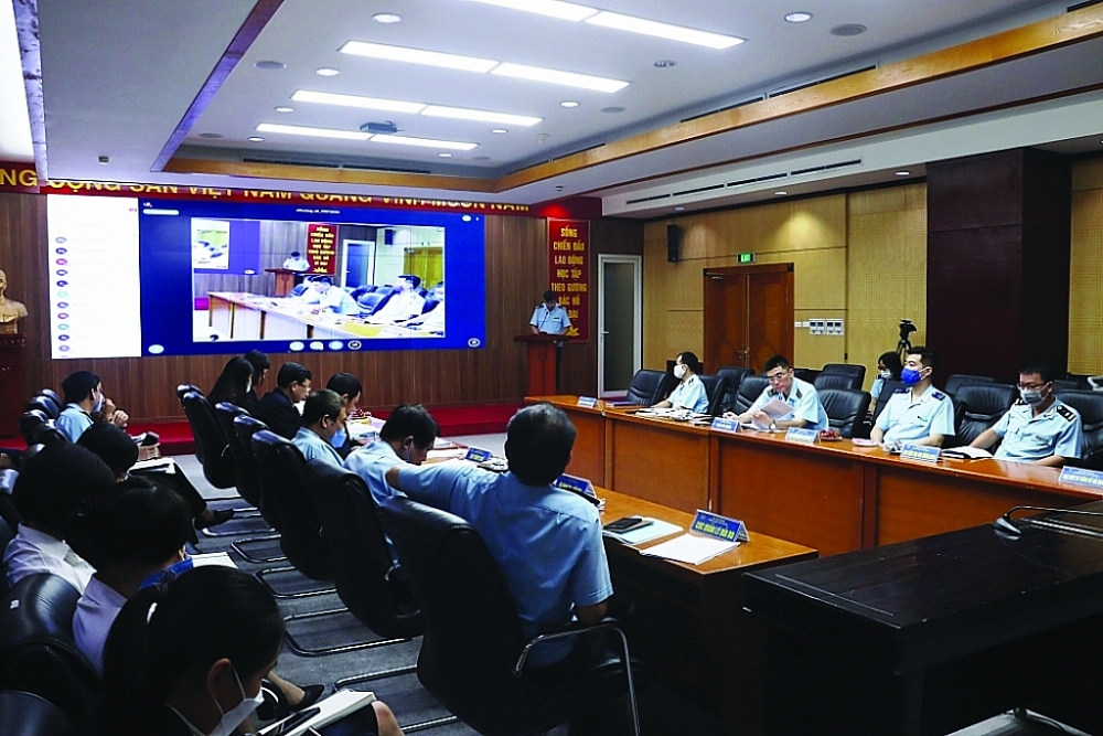 Quang cảnh Hội nghị trực tuyến đồng hành cùng doanh nghiệp vượt qua Covid-19 do Tổng cục Hải quan  tổ chức ngày 26/10/2021. 	Ảnh: Quang Hùng