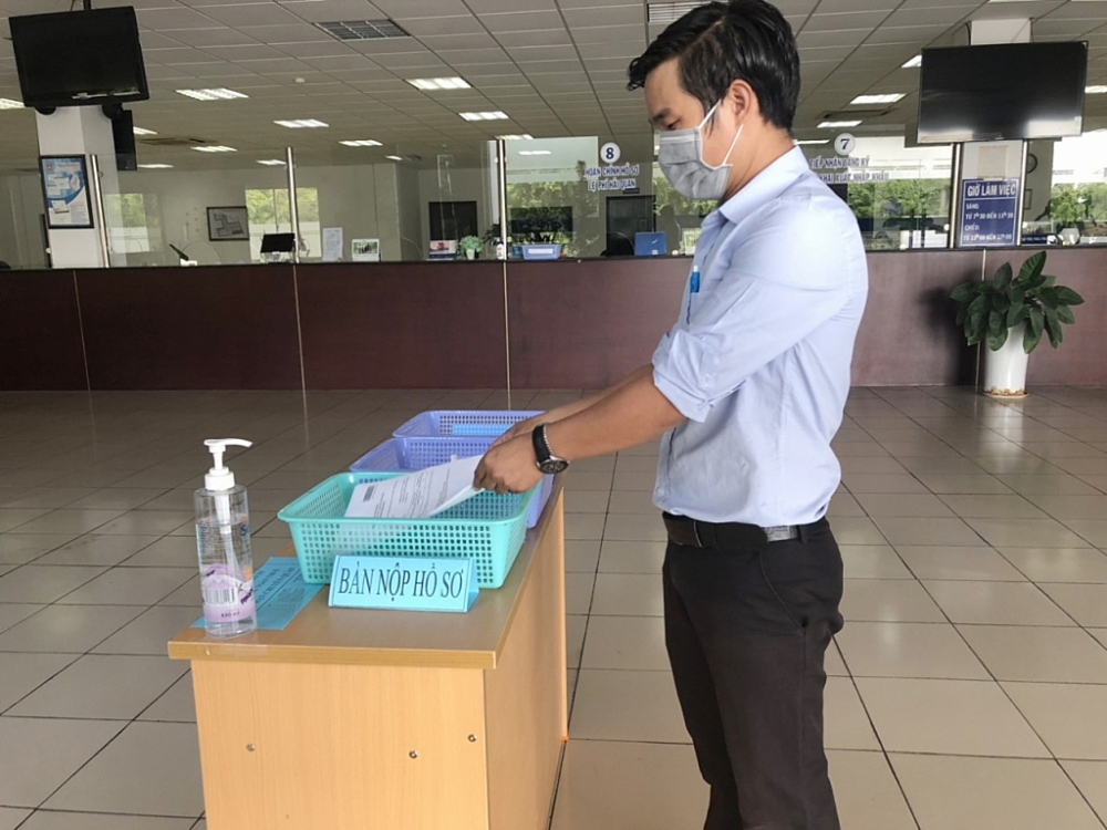 Chi cục Hải quan Thủ Dầu Một (Bình Dương) bố trí khu vực tiếp nhận tờ khai riêng biệt để đảm bảo công tác phòng chống dịch .	Ảnh: Lê Xuyền