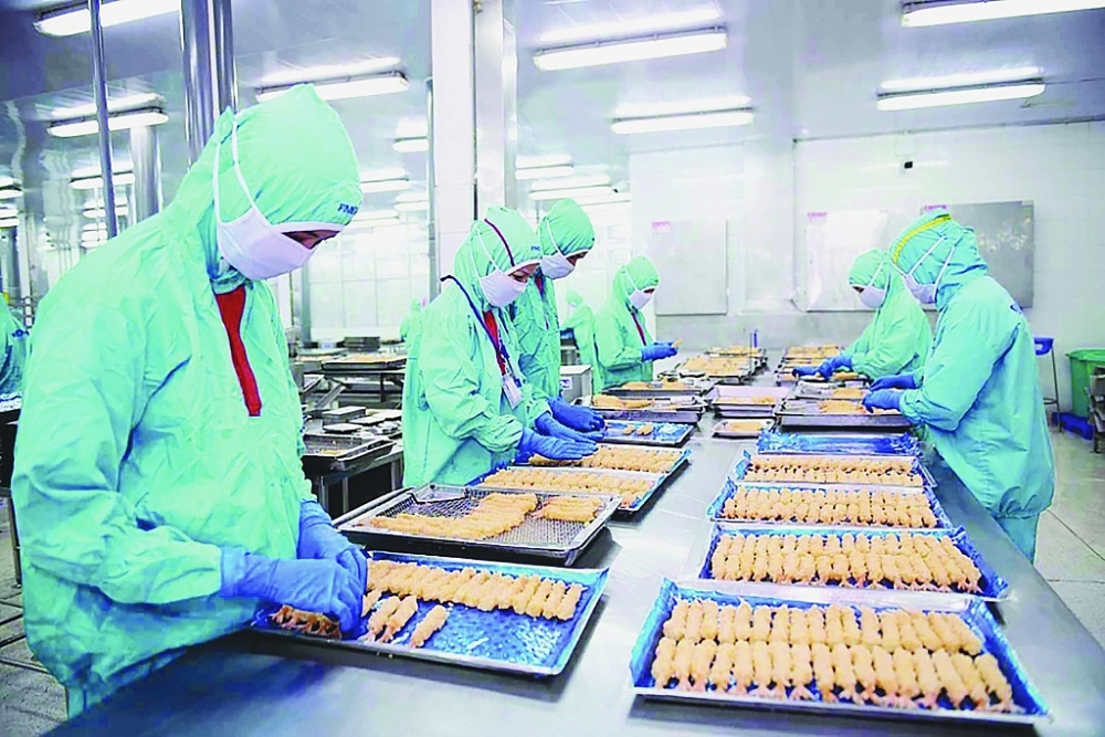 Cần thúc đẩy tạo thuận lợi hoá thương mại, hỗ trợ thông tin để mở rộng thị trường mới. 	Ảnh: TL