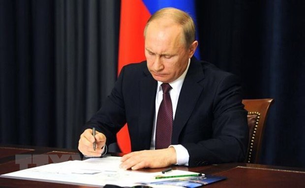 Ong Putin ky ban hanh luat cho phep tai tranh cu them 2 nhiem ky hinh anh 1